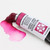 A close up image of a Daniel Smith Watercolor tube.