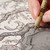 A lifestyle image of a Sakura Pigma Micron Pen in use.
