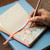 A lifestyle image of a Talens Art Creation Sketchbook.